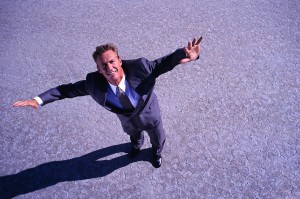 Businessman with Arms Outstretched